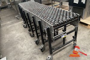45 · EXPANDABLE ROLLER CONVEYOR, FLEXIBLE SKATE WHEEL TYPE. APPROX 2.1M L (UNEXPANDED) X 60CM W X 54CM H. SOME WEAR
