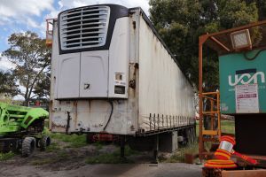 3 · 2002 Maxitrans ST3 Tri Axle TAUTLINER TRAILER Green, Tri, Carrier 2500A Refrigerator Fitted, Taut Liner Reg #: 1TIL080, Expiry: 22/10/2026 VIN: 6F8T250002B062710 Features: Mass 38,000 kgs, Carrier 2500A Refrigerator Fitted, Taut Liner, Toolbox, Spare Tyres x 2, Stabilising Legs. (WP#4959) Condition: ** Rust Evident in Floor.** Panel: FAIR, Paint: FAIR, Tyres: FAIR, Floor: POOR, Overall Condition: FAIR