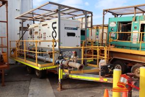 29 · 2018 GENERATING POWER PLANT GMC DEWATERING TRAILER WHITE/ORANGE, TANDEM, DIESEL, REG# UNLIC,, VIN# NOT SIGHTED, RING HITCH, SOLAR PANELS, SECTION OF PIPING & VALVES, PRO POWER GENERATOR - MODEL# LC200C, S/N: LC200C-MO1-17-00006, PRIME KVA 200, 415 V, YOM: 2018, WALKING PLATFORM ON BOTH SIDES OF UNIT (CONTROL PANEL LOOSE, MUD/DIRT RESIDUE INSIDE CONTROL PANEL & INSIDE GENERATOR, LOCKOUT PADLOCK ON ISOLATOR)