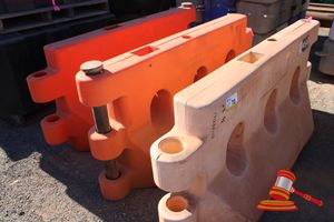 CRATE CONTAINING VARIETY OF SAFE BASE ADJUSTABLE LEAD STANDS AND 3 WATER FILLED ROAD BARRIERS