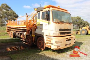 9 · 2012 Mitsubishi Fuso FS 500 EWP Truck White, 8 x 4, Auto, Diesel Reg #: Unlicensed ODO: 7,920 Kms Showing on Clock VIN: JLFFS52SS0KJ00046 Features: Air Conditioning, Power Steering, Fitted With Giraffe Equipment Australia GE7 Hi-Lift Platform - Unknown Condition, Last Statutory Inspection 10/2022, EL4001, Engine Compressor DIS-55LB, CO2152 - Unknown Condition. (Asset # LT9001) Condition: **Requires Jump Start, A/C Controls & Radio Removed.** Panel: FAIR, Paint: FAIR, Glass: FAIR, Tyres: POOR, Da