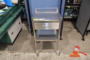 92 · 1 X 4HEALTHCARE STAINLESS STEEL MEDICAL TROLLEY, 2 TIER WITH DRAWER, MOBILE ON CASTORS, APPROX 600MM W X 900MM H (SOME MARKS)
