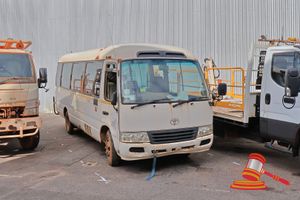 13 · 2009 Toyota Coaster Bus White, 4 x 2, Auto, 4.0L Diesel Reg #: Unlicensed, VIN: JTGFP5828605500076 Features: Air Conditioning Power Steering Towbar, Tow Hook, 16 Seater, Non Runner, (*WP# 4767*) Condition: **Non Runner - Tow Truck Required, Mechanical Condition Unknown, Rust Across The Whole Vehicle, Smashed Glass On Driver Side Door, Large Dent On Driver Side Door, Large dents Passenger Side.** Panel: POOR, Paint: POOR, Glass: POOR, Tyres: POOR, Dash: POOR, Upholstery: POOR, Floor: POOR, Overal