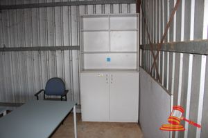 194 · GREY MELAMINE BOOKCASE AND 2 DOOR CABINET. APPROX 1200 X 450 X H2400MM