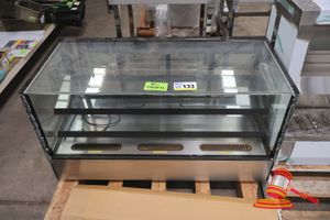 133 · STODDART AXR.FDCTSQ.12 COLD FOOD DISPLAY - SERIAL:240331RO00192. BLACK. UNIT IS DAMAGED -PARTS ONLY. FRONT DOUBLE GLAZED GLASS PANEL SMASHED. FEATURES SQUARE GLASS, 2 X TIER, INTERNAL LED LIGHTING, 2 X REAR SLIDING GLASS DOORS, ADJUSTABLE DIGITAL TEMPERATURE CONTROL, ON FEET, CLIMATE CLASS NORMAL, DOUBLE GLAZED HEATED GLASS, 10 AMP 1 PHASE. APPROX 1224MMW X 565MMD X 676MMH, 113KG. (867814). NOTE: UNIT IS DAMAGED - SOLD AS PARTS ONLY
