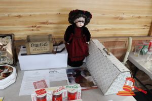 24 · VINTAGE LIMITED EDITION FRANKLIN HEIRLOOM DOLLS COCA-COLA EDITION, PORCELAIN DOLL (MORGAN) WITH WOODEN SLEIGH, WITH BOXES AND POSTERS