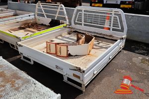 35 · METAL UTE TRAY APPROX; 1.8M W X 1.8M L X 1.1M H, CONTAINS MUDFLAPS AND METAL BEAM, SOME MARKS/RUST