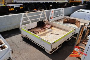 34 · METAL UTE TRAY APPROX; 1.8M W X 1.8M L X 1.1M H, CONTAINS WORK LIGHTS AND MUDFLAPS, SOME MARKS/RUST