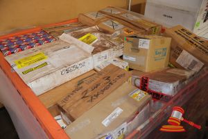 Approx 25 X Boxes Of Automotive And Mining Parts, Includes: Donaldson P502016 Lube Filter Qty 12, Britax Pt No L13 00 L12v Combination Lamp Left Qty 1, Davies Craig P/No 0736 14" Thermatic Fan High Performance (12v), Caterpillar , Hitachi ,Epiroc & 3m Parts , Various Others (Boxed), In An Orange Steel Cage