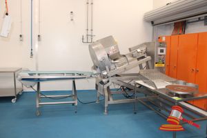 12 · TITAN SUPERIOR SLICER. 3 PHASE (PLUG). APPROX 2000 X 1000 X H1950MM. INCLUDES PORTABLE STAINLESS STEEL OUTLET FEEDER CONVEYOR SECTION (APPROX 1900 X 800 X H1000MM (BELT WIDTH APPROX 460MM), SPARE SHREDDER BLADE AND ACCESSORIES. NOTE: REMOVED FROM SERVICE 24TH JULY 2026. PURCHASER TO ARRANGE REMOVAL - SPECIALIST REMOVALIST REQUIRED - TO BE LOADED BY HIAB