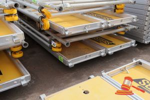 82 · 2 X ALUMINIUM FRAMED PLATFORMS, APPROX; 600MM W X 2.4M L X 60MM, 3 X METAL FRAME SIDES, APPROX; 1.3 M W X 2.9 M H, SOME MARKS, ON A PALLET