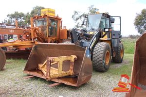 2009 Komatsu WA320PZ-6 Tool Carrier ODO: 17,519 hrs Showing S/N: 70529 VIN: KMTWA108J01070529 Komatsu Fork Attachment, Type: 419 - T81 - 4301, S/N: 1091, GP Bucket & Jib (E01 Coolant Low fault Showing on Dash display, Rust & Corrosion Throughout, Cab Entry Door Stuck Open - Jammed on Wheel Guard)