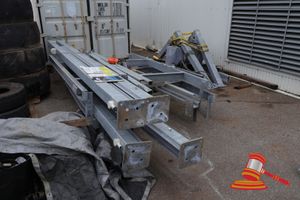 2 X 2 Post Vertical Lift (Trailer) Stackers With Electrical Hoist And Wired Pendant Control. Swl 2ton. Disassembled. Includes (Per Stacker) 2 X 125 X 125 X Approx H4900mm Galvanised Upright Posts With Base Plates, Electric Hoist In Metal Frame With Pendant Control, Lifting Frame ( Approx 2600 X 1850mm), Support Beams, Fittings And Sundry Items. Used By Hire Company To Vertically Store 3-4 Trailers. Can Be Used For Other Lifting/Storage Uses. Untested