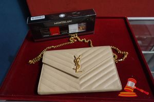 1 X YVES SAINT LAURENT CLUTCH BAG ON CHAIN, BEIGE QUILTED LEATHER. AUTHENTICITY UNVERIFIED, 1 X MONTBLANC FRAGRANCE GIFT SET. UNUSED