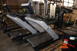 25 · TREADMILL, COMMERCIAL STYLE, GREY FRAME WITH SCREEN, APPROX; 850MM W X 1.8M L X 1.6M H, SOME MARKS, UNTESTED, ON A PALLET