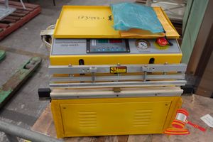 115 · EXTERNAL VACUUM PACKING MACHINE, DZQ-400TE, YELLOW, APPROX 500MM W X 370MM D X 390MM H, POSS UNUSED, UNTESTED,SEALED