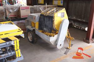 61 · 1 X PUTZMEISTER TRAILER MOUNTED CONCRETE PUMP, YELLOW, WITH GALVANISED PROTECTIVE CAGES, SOME MARKS, SURFACE RUST, WEAR CONSISTENT WITH USE, APPROX; 2M L X 1.5M W X 1.4M H, TYRES PERISHED