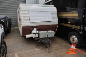 4 · JAYCO SONGBIRD POP- TOP CARAVAN APPROX 14 FT, CIRCA: 1980'S, UNREGISTERED, VIN: NOT SIGHTED, WOOD CABINETRY, VINYL FLOORING, EXTERNAL POWER AND WATER PORTS, TOOL BOX, GAS BOTTLE. NOTE: PAINT FADED, INTERIOR WALLS PEELING, CONDITION: POOR. ( KEY# 59 )