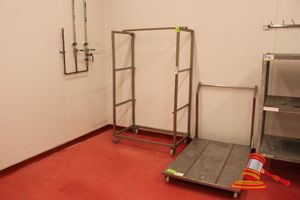 1 X Stainless Steel Mobile 3 Tier Hanging/Drying Rack. Approx 1050 X 610 X H1800mm And 1 X Stainless Steel Flatbed Trolly (Perforated Deck). Approx 850 X 1200mm. Wheels Squeaky