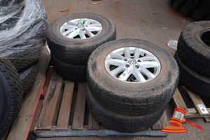 4 X TRIANGLE 292 ALL TERRAIN TYRES, 245/70R16, 111S, WITH SILVER RIMS, SOME MARKS ON A PALLET