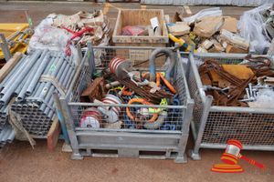 1 X Metal Crate Of Lifting Equipment, Includes: Heavy Duty Chain Links (Blue), Lifting Shackles (Orange, Yellow, Grey), Electrical Insulators With Brackets, Assorted Rusted Steel Rods, Rope, Various Others (Used, Rusted)