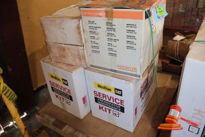 4 X Boxes Of Service Parts, Includes: 2 X Westrac Caterpillar Preventative Maintenance Kits, 2 X Hitachi Frefl80kit Filter Kits - (Boxed), On A Pallet