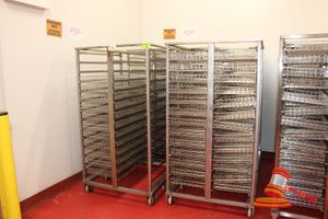 83 · 4 X STAINLESS STEEL 14 TIER MOBILE TROLLEYS (APPROX 930 X 1000 X H1800MM) WITH APPROX 56 STAINLESS STEEL MESH BASKETS (APPROX 400 X 500 X H80MM) PER TROLLEY. 1 TROLLEY HAS 22 BASKETS