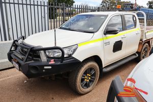 2023 Toyota Hilux Dual Cab Tray White, 4 x 4, Auto, 2.8L Diesel Reg #: 1HXK281, Expiry: 6/09/2026 ODO: 18,686 Kms Showing on Clock Eng #: 1GD5349806 VIN: MR0KA3CD401286906 Features: Air Conditioning, Power Steering, Bullbar, Lightbar, Sidesteps, Spare Wheel, Work Lightbar, Fire Extinguishers, M2AP02 Master. (Asset # UFR38), (*Key # 142, WP# 4932*) Condition: **Rust On Tray, Bent Rear Fold Down Sides, Part Of Mirror Assembly Detached, Bullbar Slightly Detached.** Panel: FAIR, Paint: FAIR, Glass: