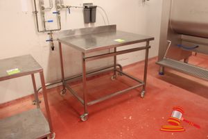 21 · STAINLESS STEEL MOBILE BENCH WITH SPLASHBACK. APPROX 1160 X 900 X H1000MM