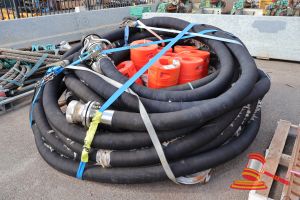 93 · 2 X INDUSTRIAL HOSE REEL ASSEMBLY, COILED BLACK HOSE WITH METAL END FITTINGS, SECURED WITH BLUE RATCHET STRAPS,APPROX; 15M, APPROX 8 RED BOUYS, APPROX; 280MM D X 520MM H (SOME WEAR TO HOSE WRAPPING), ON A PALLET