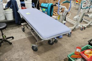 1 · 1 X KELLY EQUIPMENT HOSPITAL TROLLEY / GURNEY, LIGHT BLUE VINYL MATTRESS, MODEL: KH604SP, SERIAL NO: 604-132, APPROX 2.2M (SOME MARKS)