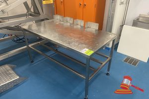 13 · STAINLESS STEEL BENCH WITH UNDER BENCH RACK. 4 X GUIDES WELDED TO TOP. APPROX 1500 X 800 X H930MM.