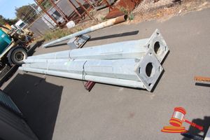 13 · 2 x Galvanised Steel Octagonal Lighting/Utility Poles, 2 Piece, Make: AD Coote & Co, DOM: 2015, Serial: R115857, Base Pole Approx: 7620mm L, Extension Pole Approx: 7790mm.