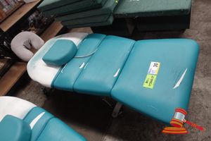 30 · 1 X ATHLEGEN ELECTRIC TREATMENT TABLE, APPROX; 1.7M L X 660MM W X 670MM H , DAMAGED BACK REST AND TORN FABRIC, UNTESTED (SOME MARKS)