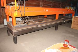 57 · CERAMIC LINING PIPE ROLLER FRAME WITH SLIDERS (BLACK STEEL). INCOMPLETE - FRAME ONLY. OVERALL DIMENTIONS APPROX 6500 X 1300 X BED HEIGHT 800MM
