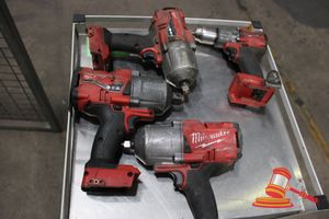 40 · ASSORTED MILWAUKEE TOOLS, INCLUDES, IMPACT WRENCHES, HAMMER DRILL, AND 165mm CIRCULAR SAW, NO BATTERIES, SOME MARKS, UNTESTED