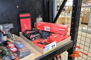 Tray Of Milwaukee Tools And Accessories Including Fuel Cordless Impact Wrench, M18 Cordles Shockwave Screwdriver Bit Set In Case, 3 X M18 Batteries, M12 Sio Soldering Iron, Milwaukee Tool Pouch , And Impact Wrench