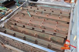 125 · APPROX 25 X GREEN RUBBER LOCKING STRIPS, APPROX ; 1M L X 100MM W, WITH BOLTS, IN A METAL STILLAGE, APPROX; 1.1M W X 1.1M D X 500MM H