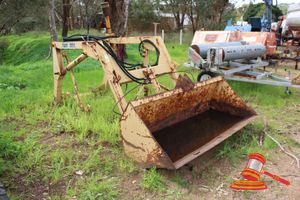 11 · PEDERICK FARM EQUIPMENT MAGNUM LOADER ATTACHMENT WITH BUCKET. YELLOW