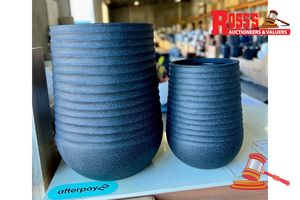 Matching set of 2 Mediterranean Black Planters - Sizes: 39 x 51 cm, 28 x 37 cm, RRP $230 Create a stylish designer display from the RippleLite Tower range, featuring a tall sculptural planter with a subtle horizontal ribbed finish, this range brings a clean, contemporary look to homes, patios, courtyards, entryways and landscaped spaces. Constructed from super-light resin blend, it combines practical lightweight handling with a premium look. It is designed for indoor and outdoor use, UV resistan