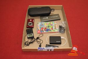 Tray Of Assorted Items Including 1 X Bose Portable Speaker, 1 X Kodak Pixpro F255 Digital Camera, 1 X Portable Am/Fm Stereo Radio, 1 X Sony Walkman Digital Music Player , 1 X Ultra Walk & Talk Charger, 1 X Apple Ipod Shuffle, 1 X Nintendo Switch Minecraft & Sports Games, 1 X Precision Screwdriver Set. All Items Used, Untested