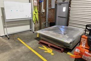 Qty Of Disassembled Light Timber Grain Laminate Furniture And 1 X Mobile Whiteboard (Approx 1570 X H1900mm. Furniture - 1 X Corner Desk (Approx 1400 X 2100 X H700mm), 1 X Desk With Shelving Unit (Approx 1800 X 900 X H1950mm), 1 X Desk Extension With Ciupboard And Shelf (Approx 1200 X 600 X H1950mm)