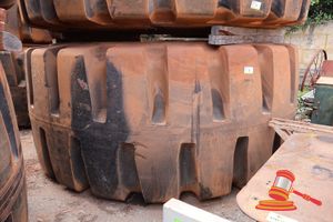 2 · 1 X EARTHMOVING TYRE, D-LUG, 65/65-57, SN: S52002796, APPROX 3.8M DIAMETER, (SOME MARKS)